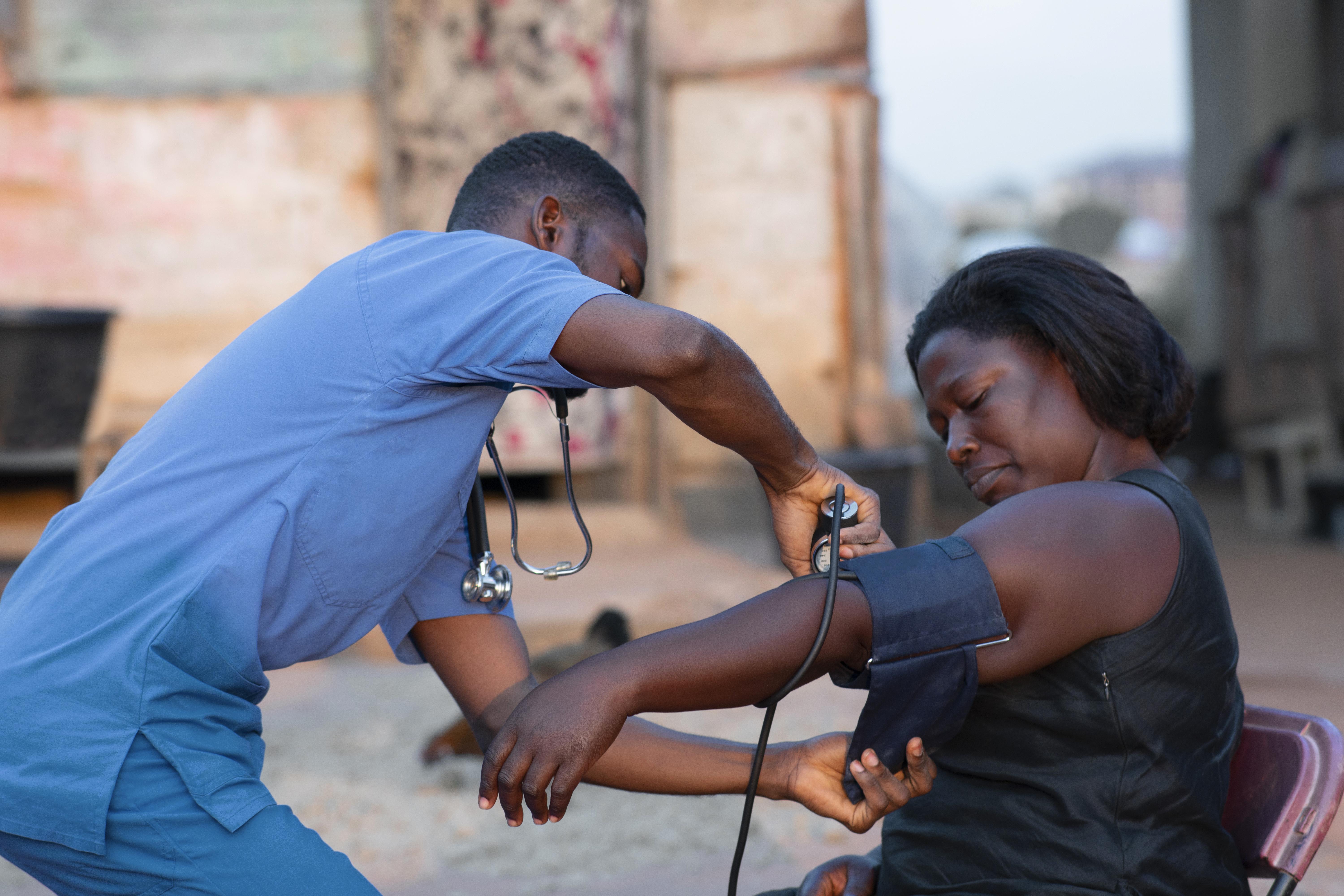 A health worker taking care of a patient in the community
